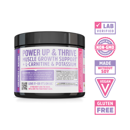 A black tub of Zhou Nutrition Creatine for Her with white labels and five pink circular certification badges.