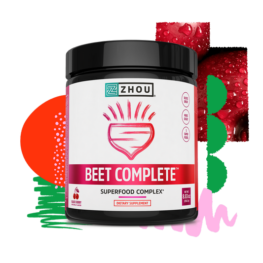A jar of Zhou Nutrition Beet Complete beet root powder with abstract shapes and a beet illustration in the background.