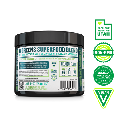 A tub of Zhou Nutrition Daily Greens, a non-GMO, vegan powder with a 60-day guarantee, made in Utah.