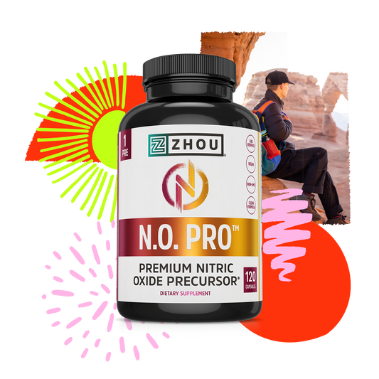 A bottle of Zhou Nutrition N.O. Pro with nitric oxide formula, shown by a hiker resting near a rock formation.